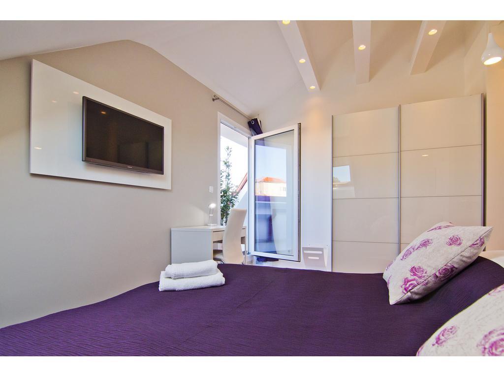 Laura Lux Suites Split Quarto foto