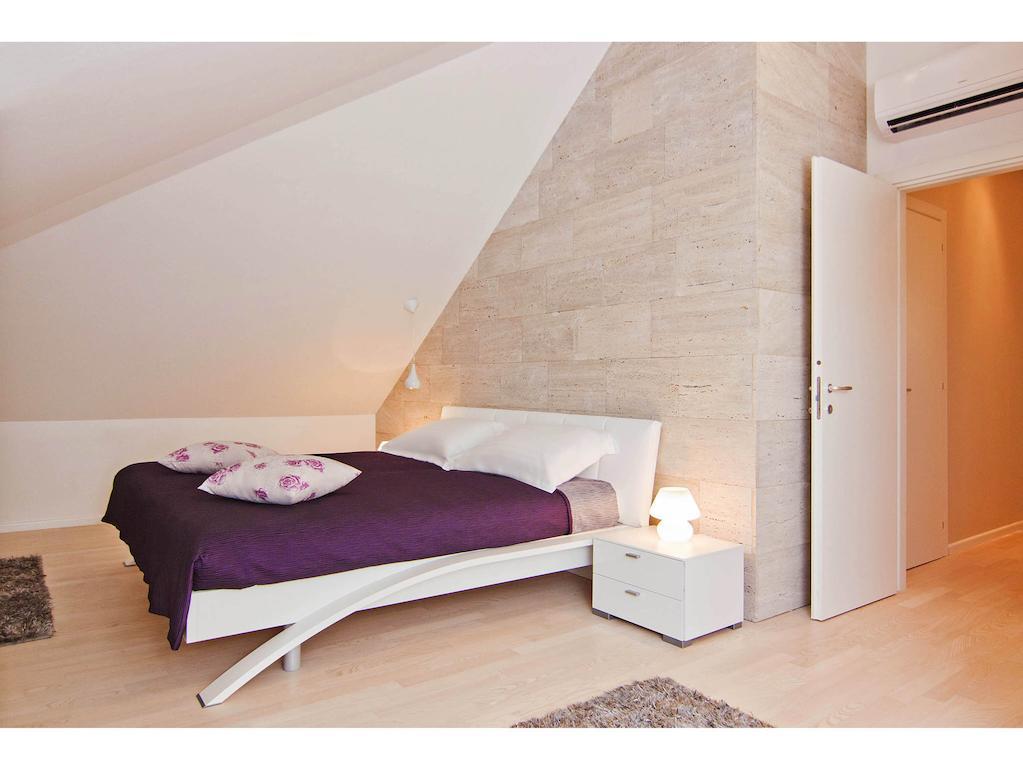 Laura Lux Suites Split Quarto foto